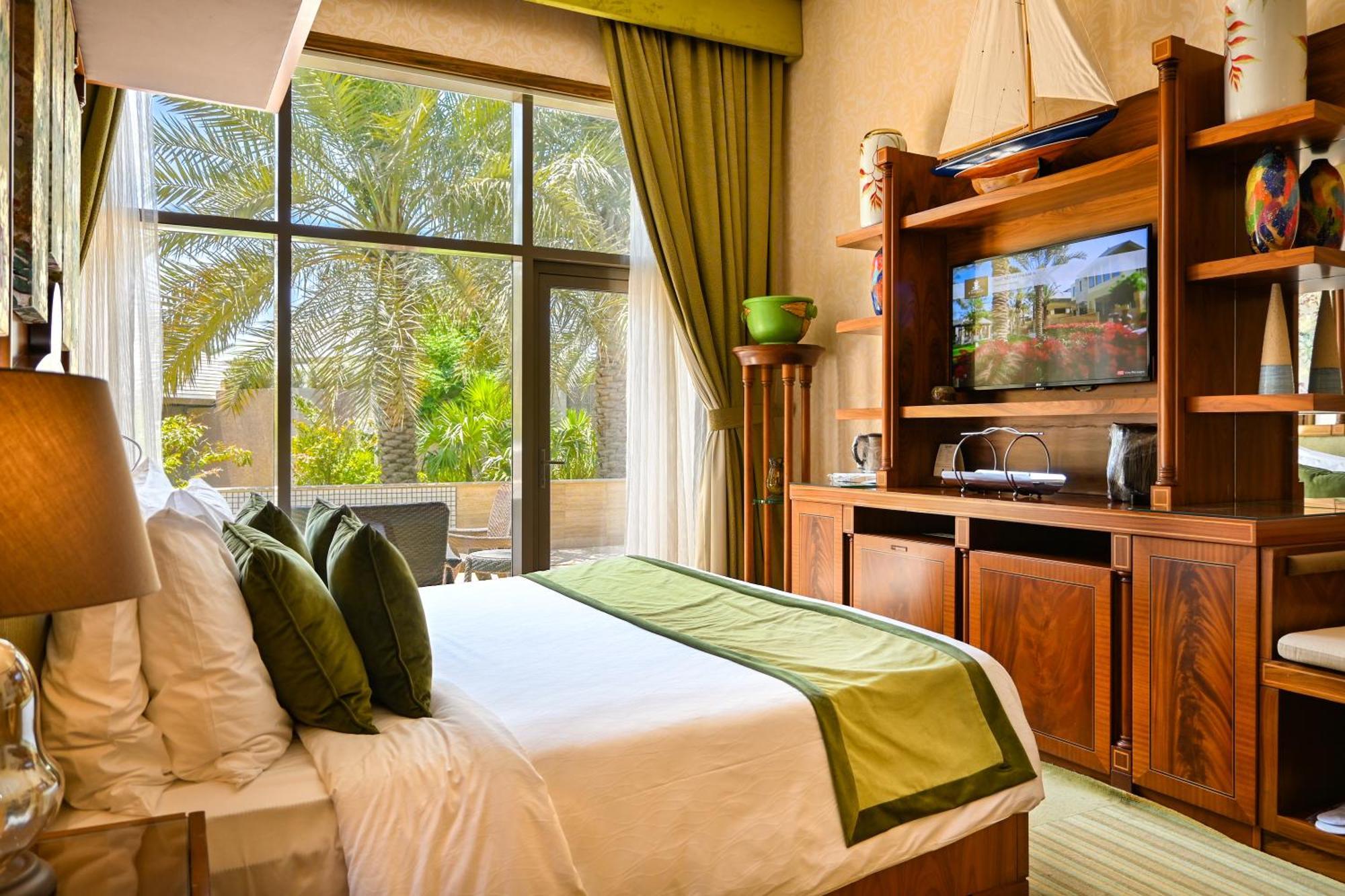 מנאמה Palavra Resort מראה חיצוני תמונה A bedroom at the resort
