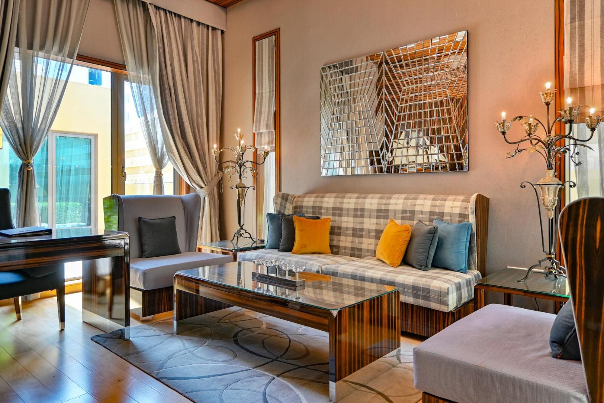 מנאמה Palavra Resort מראה חיצוני תמונה A living room at the hotel