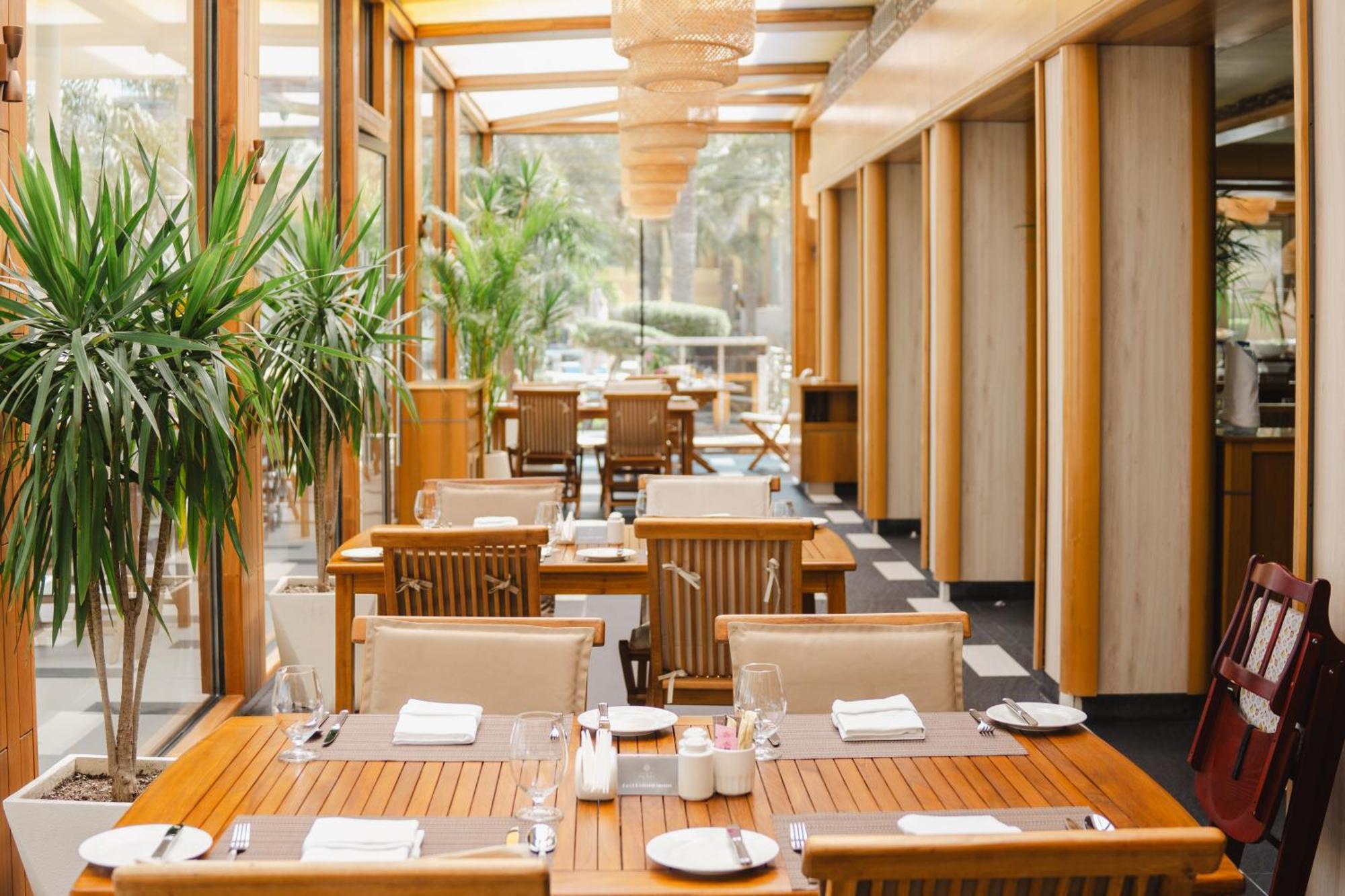 מנאמה Palavra Resort מראה חיצוני תמונה The restaurant