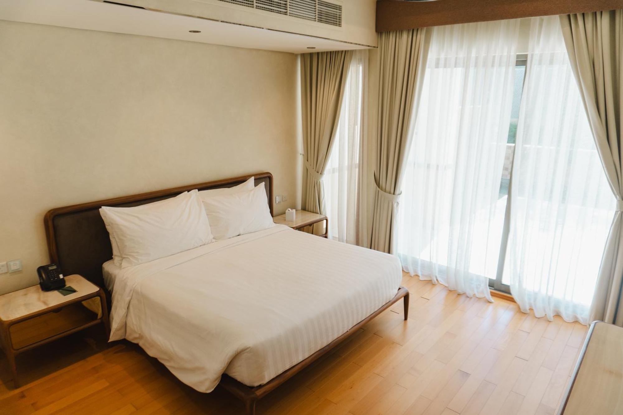 מנאמה Palavra Resort מראה חיצוני תמונה A bedroom at the hotel