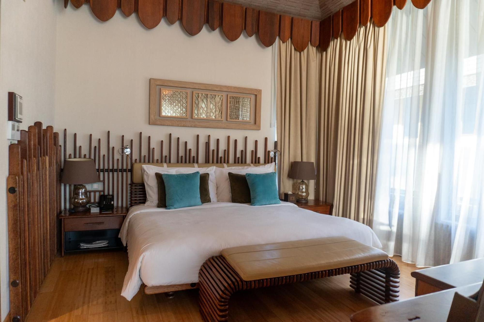 מנאמה Palavra Resort מראה חיצוני תמונה A bedroom at the hotel
