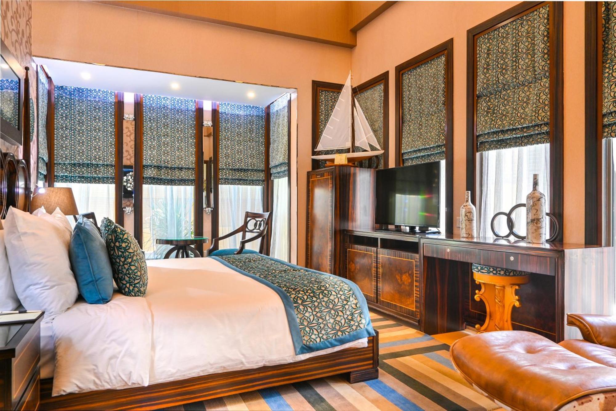 מנאמה Palavra Resort מראה חיצוני תמונה A bedroom at the resort