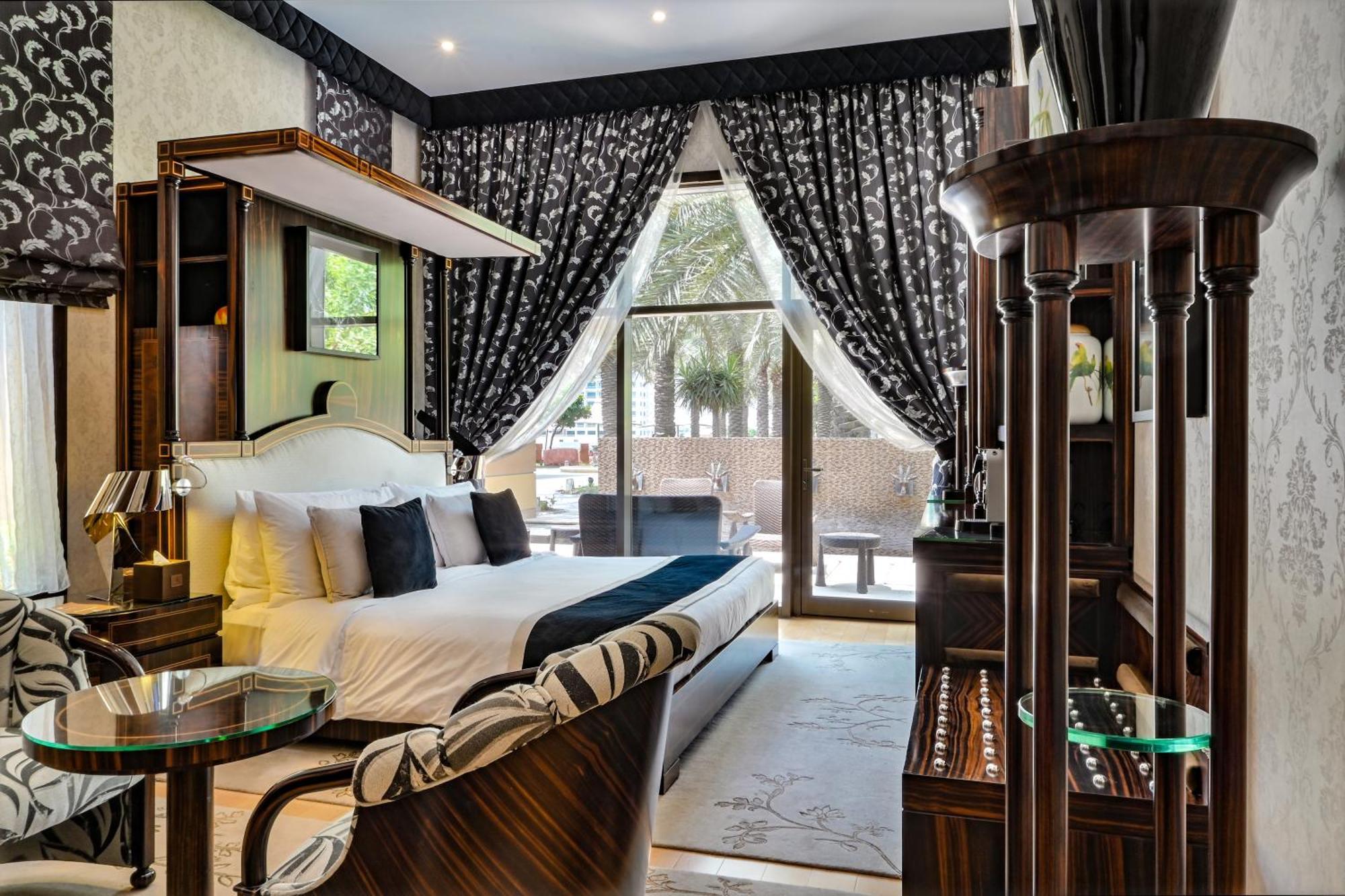 מנאמה Palavra Resort מראה חיצוני תמונה A bedroom at the hotel