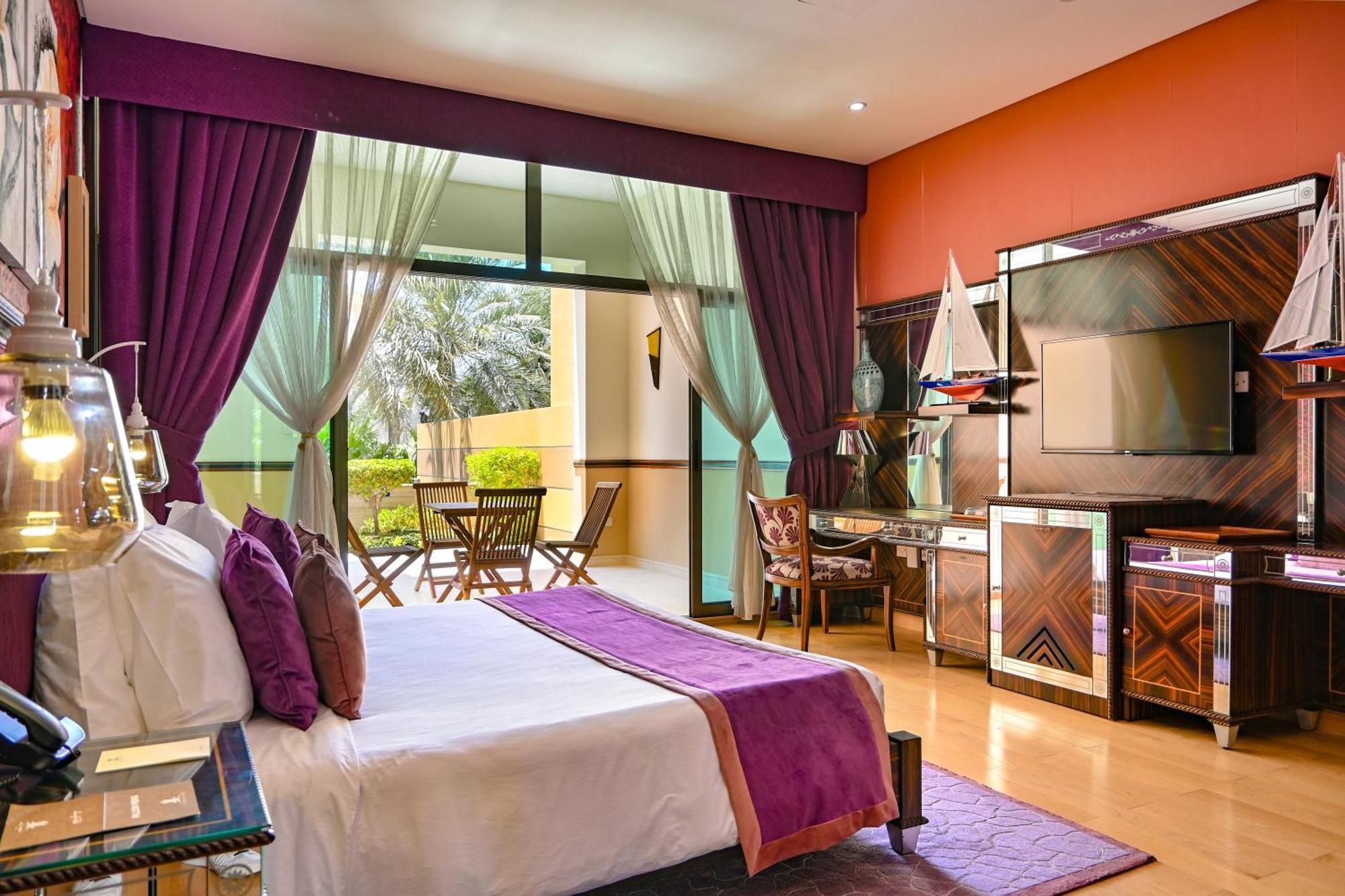 מנאמה Palavra Resort מראה חיצוני תמונה A bedroom at the hotel