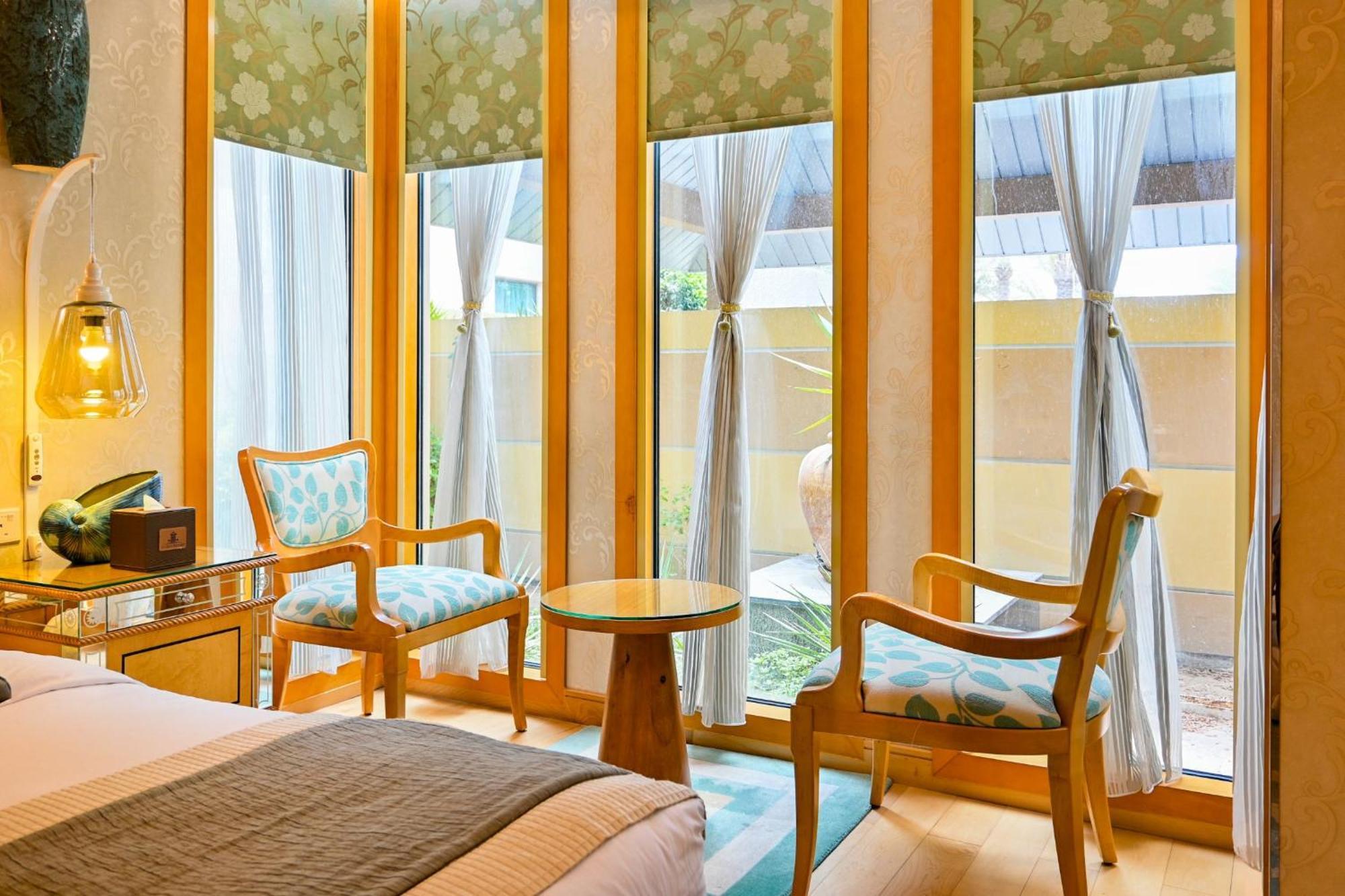 מנאמה Palavra Resort מראה חיצוני תמונה A room at the hotel